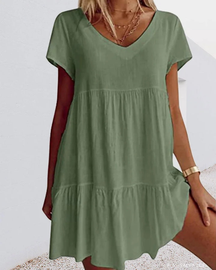 Grünes Leinenkleid mit V-Ausschnitt für Damen, mit Rüschen und kurzarmig - elegante sommerliche Garderobe für stilbewusste…