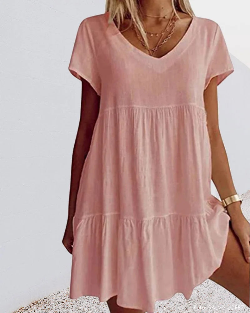 Rosa Leinenkleid mit V-Ausschnitt, Rüschen und Kurzarm für Damen - leichtes und luftiges Sommerkleid in femininem Design.