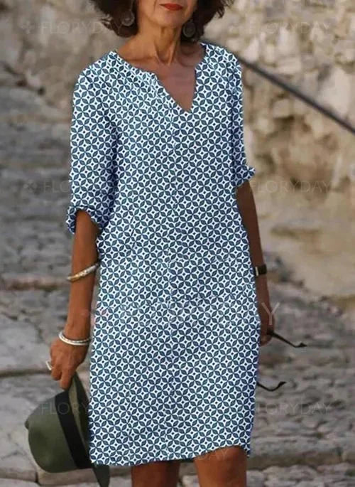 Blaues Damen V-Ausschnitt Midikleid mit geometrischem Muster aus leichtem Stoff, perfekt für den Sommer oder besondere…