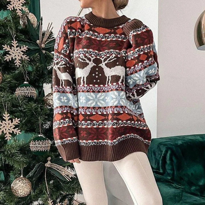 Damen Weihnachtspullover aus weichem Material mit Rentier-Druck und Rundhalsausschnitt für gemütliche Festtage.