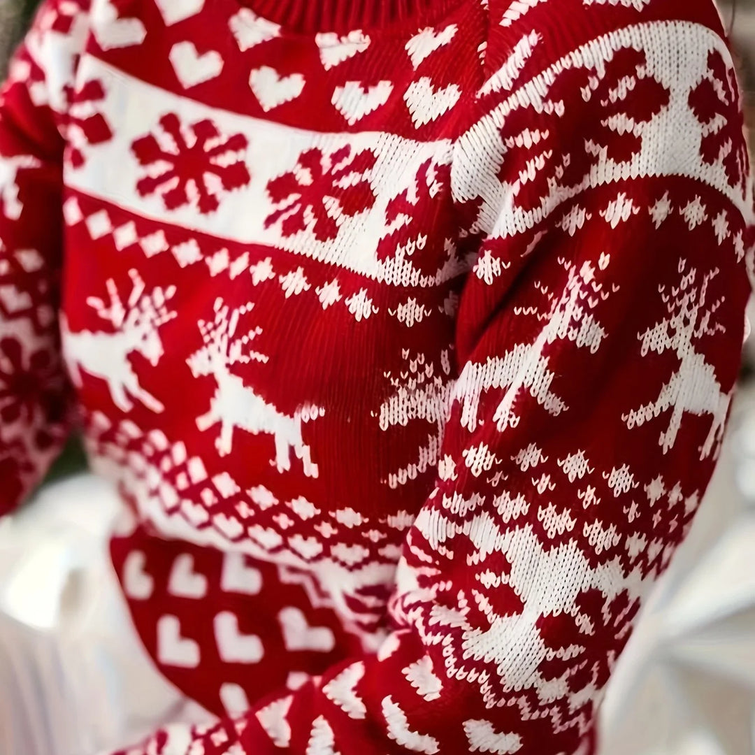 Damen Weihnachtspullover in Rot-Weiß mit Rentier- und Schneeflockenmuster, aus weichem, atmungsaktivem Material gefertigt.