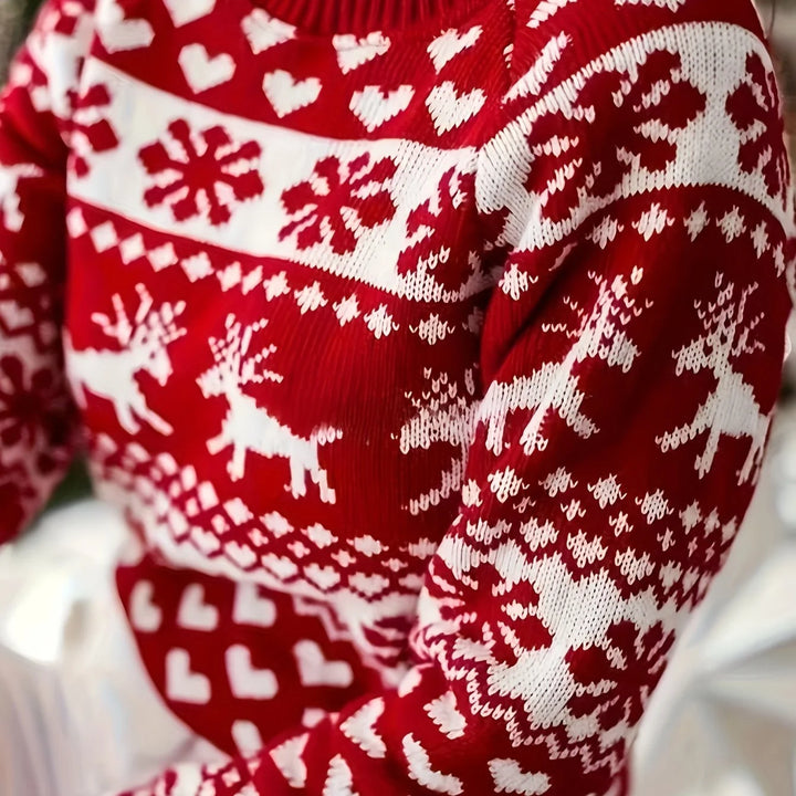 Damen Weihnachtspullover in Rot-Weiß mit Rentier- und Schneeflockenmuster, aus weichem, atmungsaktivem Material gefertigt.