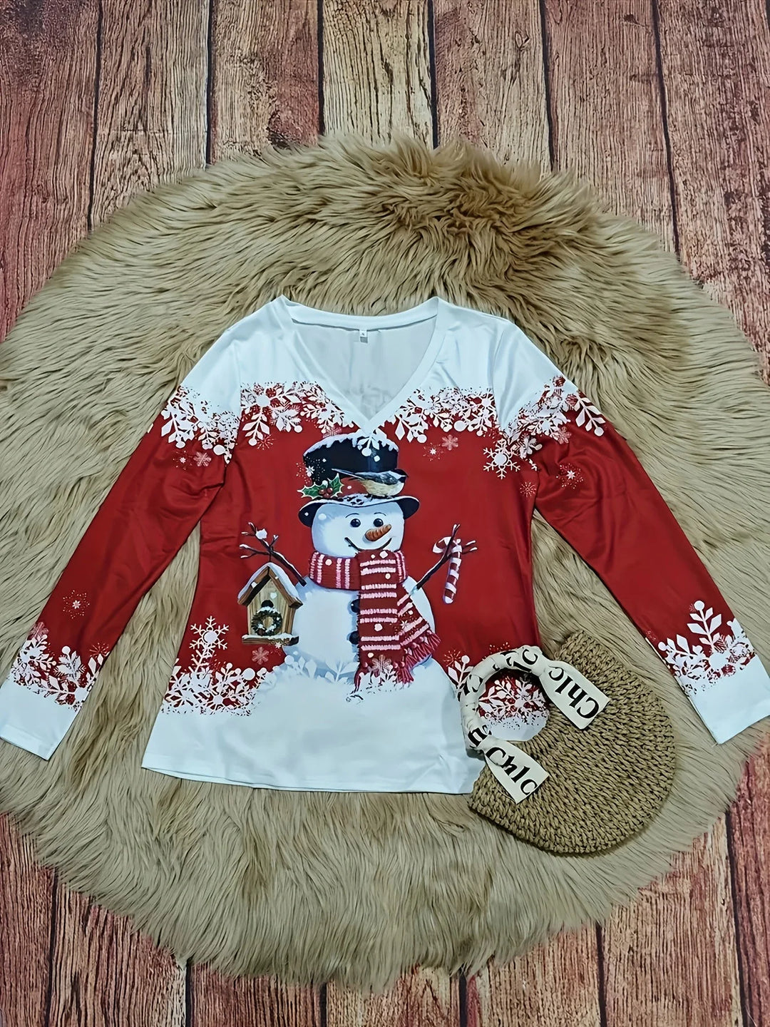 Damen Weihnachtspullover aus weichem Baumwollmix mit V-Ausschnitt und Schneemann-Motiv für festliche Anlässe.