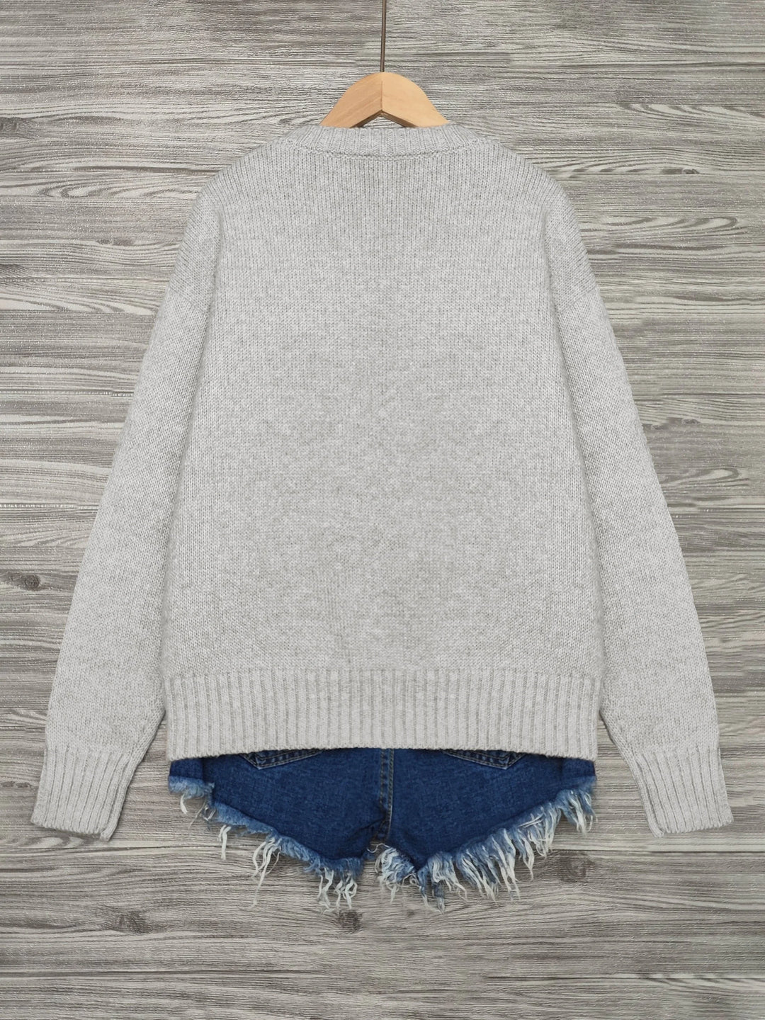 Damen Weihnachtspullover aus weichem Material mit Schneemannmotiv und Rundhalsausschnitt, ideal für die Festtagszeit.