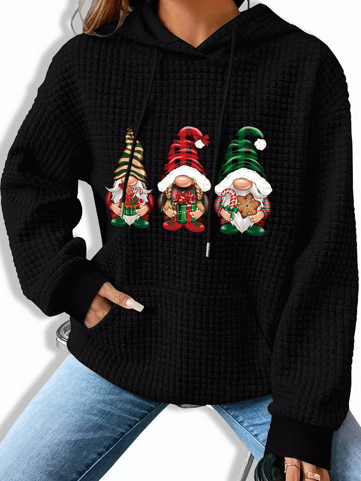 Damen Weihnachtspullover mit Wichteldruck und Kapuze, aus weichem Material, gemütlicher Schnitt und festlichem Design.