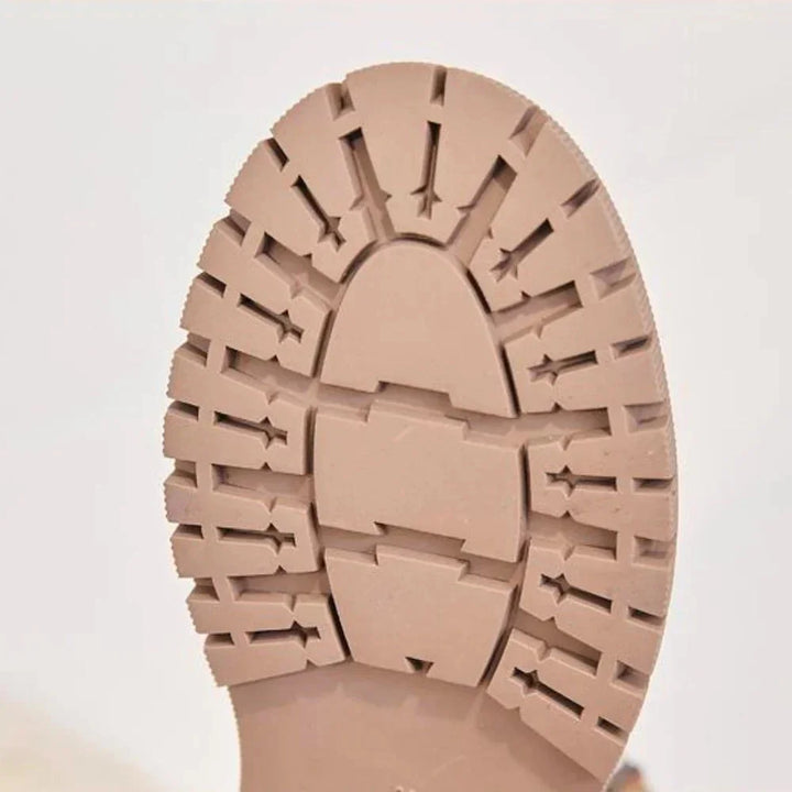 Damen-Winterboots aus wärmendem Futter und strapazierfähiger Sohle, ideal für kaltes Wetter und rutschige Untergründe.
