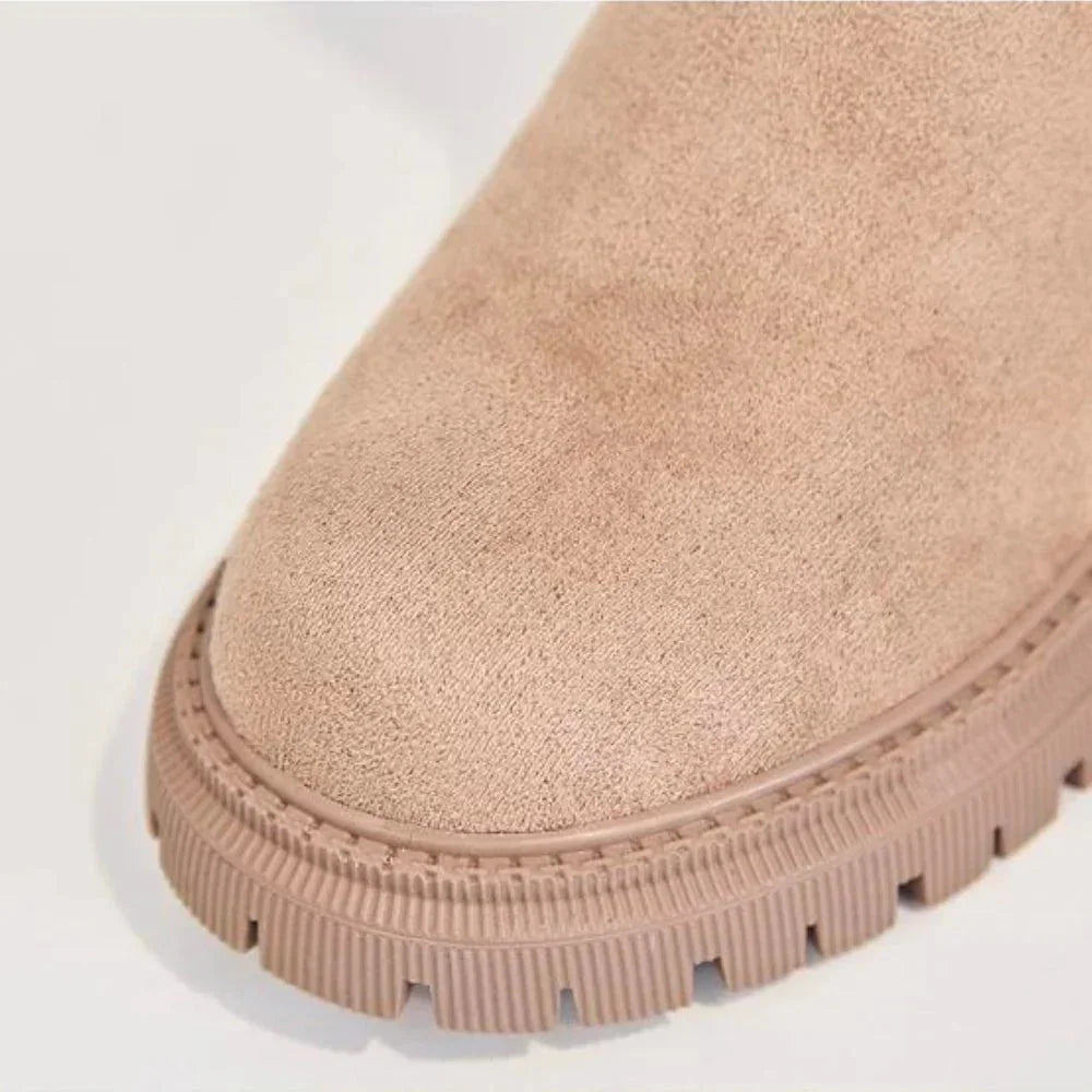 Damen-Winterboots aus warmem Fleece-Futter und rutschfester Sohle für besseren Halt im Winter.