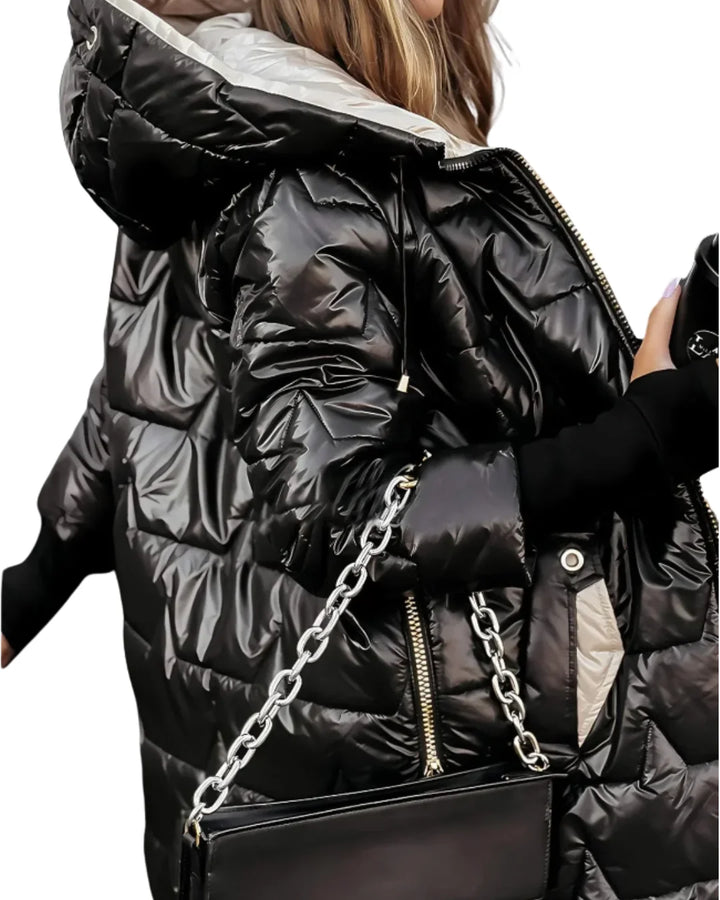 Damen Winterjacke aus warmem Material, mit Kapuze und modischem Steppdesign für optimalen Komfort und Schutz vor Kälte.
