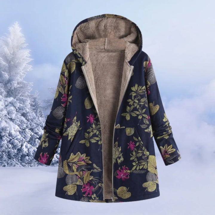 Dunkelblaue Damen Winterjacke mit Blumenmuster, Kapuze und warmem Material für kalte Tage. Ideal für den Alltag.