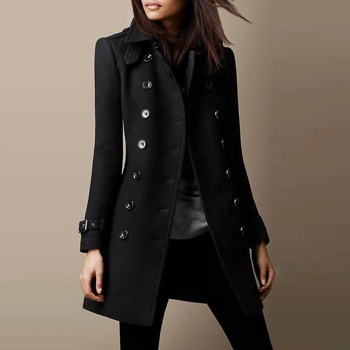 Damen schwarzer zweireihiger Trenchcoat aus Baumwolle mit Knopfdetails und klassischem Schnitt für vielseitige Styles.