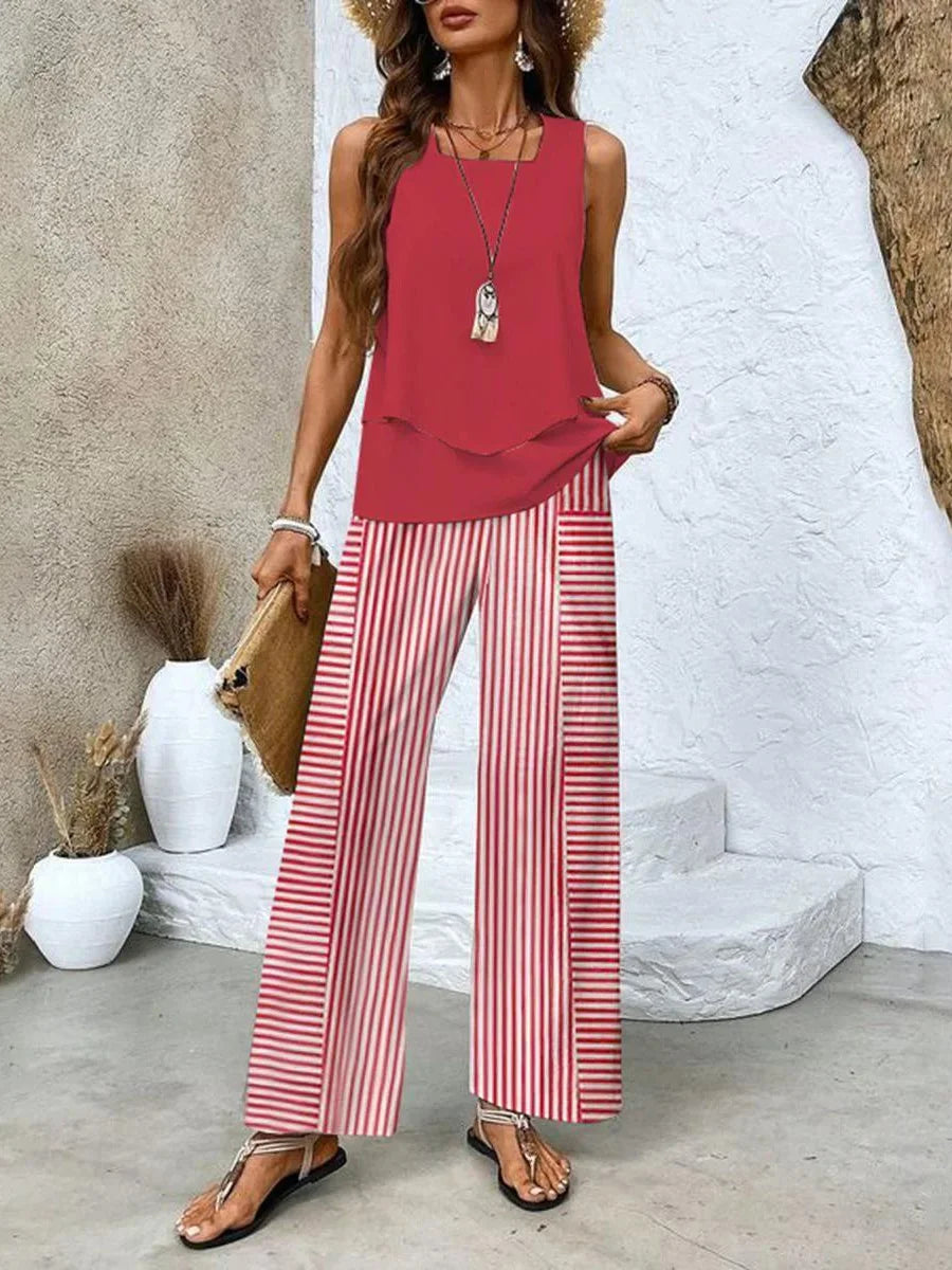 Rotes Damen Zweiteiliges Set: Ärmelloses Top und bedruckte Hose, aus leichtem Stoff.