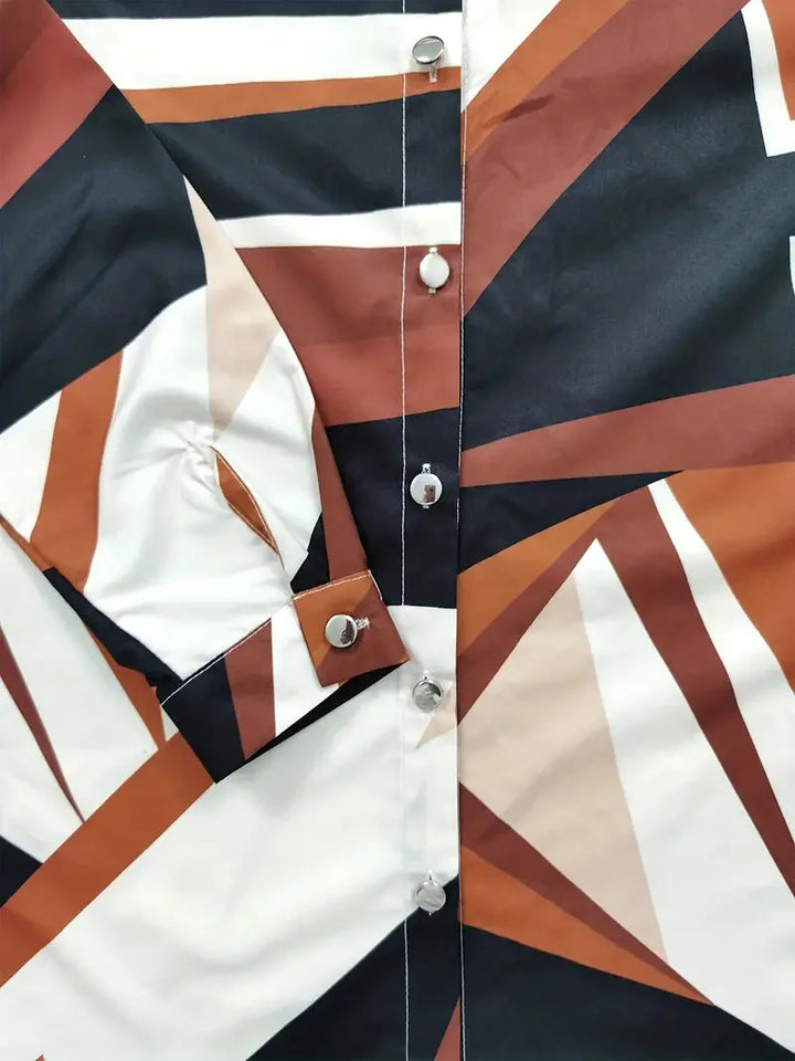 Damenbluse aus leichtem Baumwoll-Mix mit Blattmuster und eleganten Dreiviertelärmeln für einen lässigen Look.