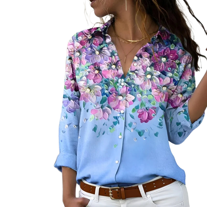 Blaues Damenbluse aus leichtem Baumwollmix mit Blumendruck, lässigem Schnitt und kurzen Ärmeln für vielseitige Styles.