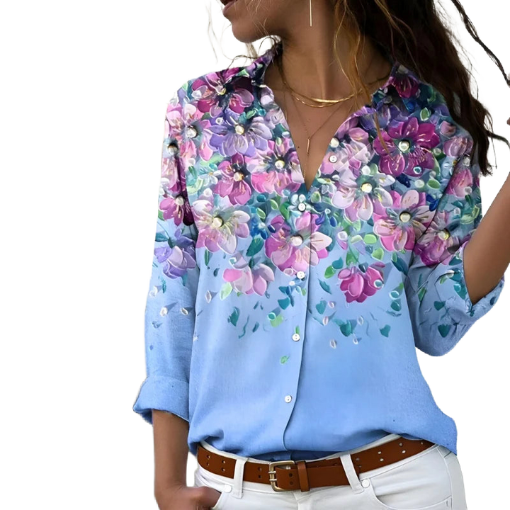 Blaues Damenbluse aus leichtem Baumwollmix mit Blumendruck, lässigem Schnitt und kurzen Ärmeln für vielseitige Styles.