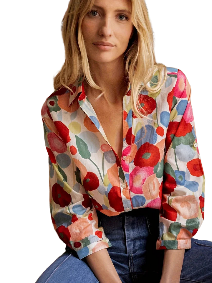 Damenbluse aus weichem Stoff mit buntem Blumenmuster und langen Ärmeln für einen frischen, femininen Look.