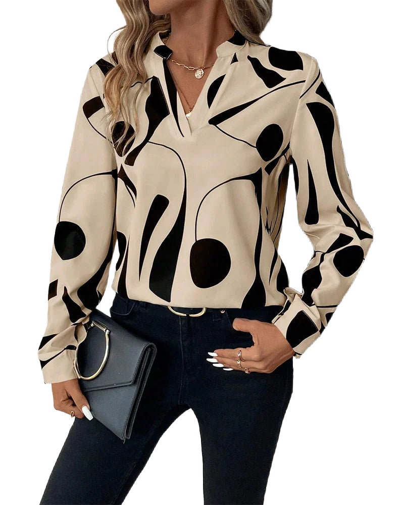 Damenbluse mit grafischem Muster, Stehkragen, aus leichtem Baumwollmaterial für angenehmen Tragekomfort und sorgt für…