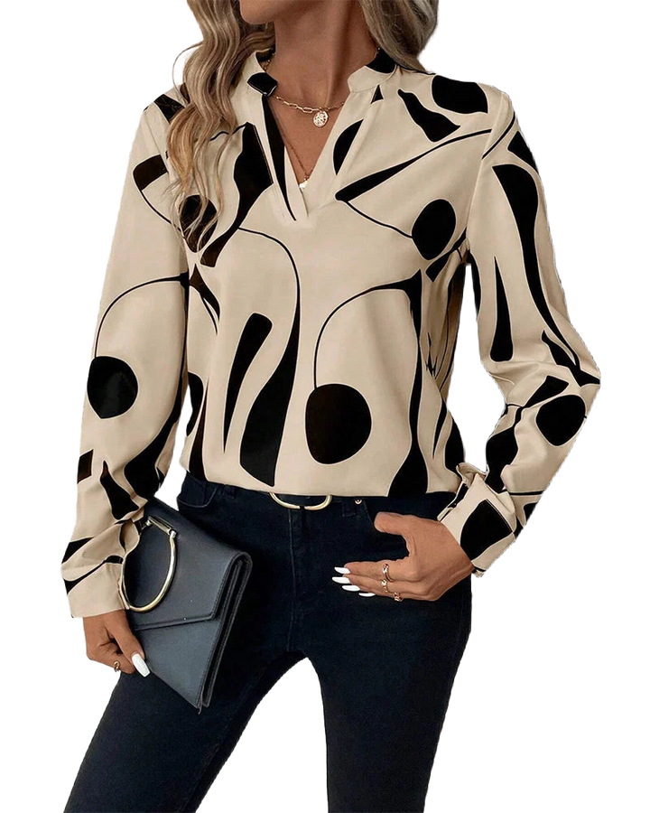 Damenbluse mit grafischem Muster, Stehkragen, aus leichtem Baumwollmaterial für angenehmen Tragekomfort und sorgt für…