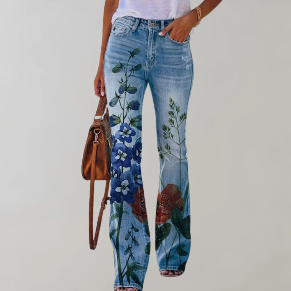 Damenhose mit weitem Bein und buntem Blumendruck in Blau, aus leichtem, atmungsaktiven Material für optimalen Komfort.