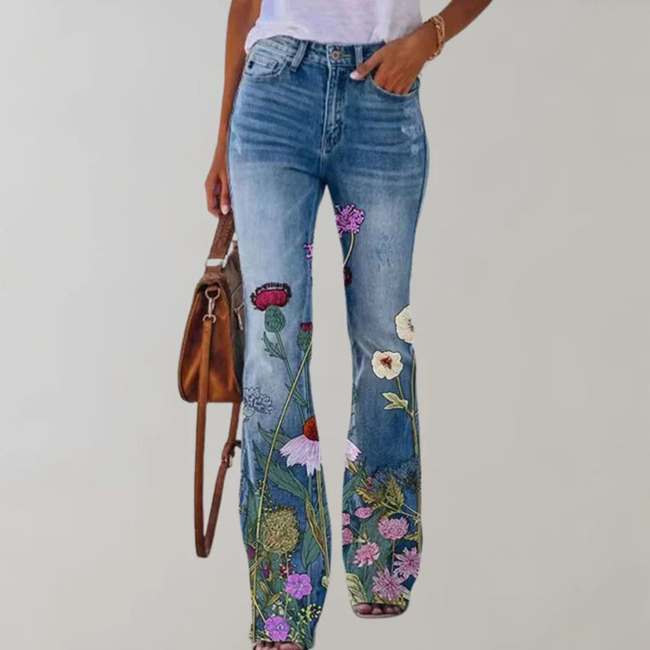 Damenhose mit weitem Bein und rotem Blumendruck, aus leichtem Baumwollmaterial für den Sommer, elastischer Bund für Komfort.