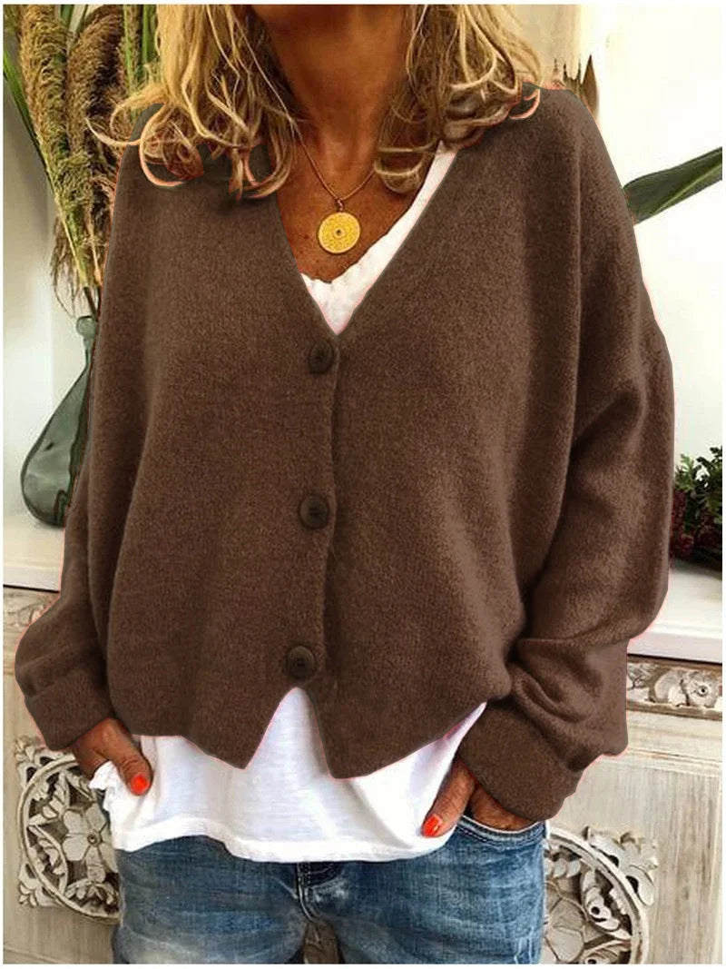 Braune Damenkurzstrickjacke mit V-Ausschnitt, Knöpfen, leichtem Strickmaterial und modischem Design für versatile Outfits.