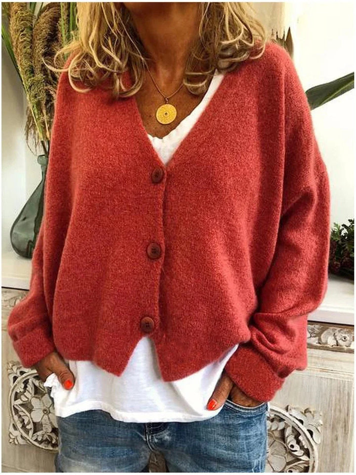 Damenkurzstrickjacke in Orange-Rot, V-Ausschnitt, mit bequemen Knöpfen und weichem Material für lässige Looks.