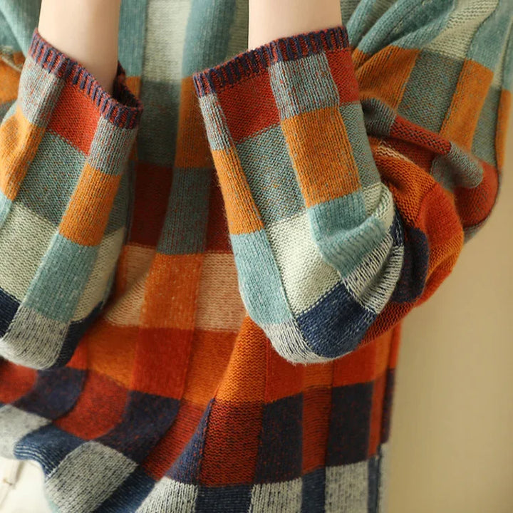 Damenpullover mit buntem Karomuster, Rollkragen aus weicher Baumwollmischung, ideal für kühle Tage und lässige Outfits.