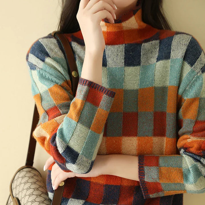 Damenpullover mit farbigem Karomuster, Rollkragen aus weicher Strickware, ideal für den Herbst und Winter.
