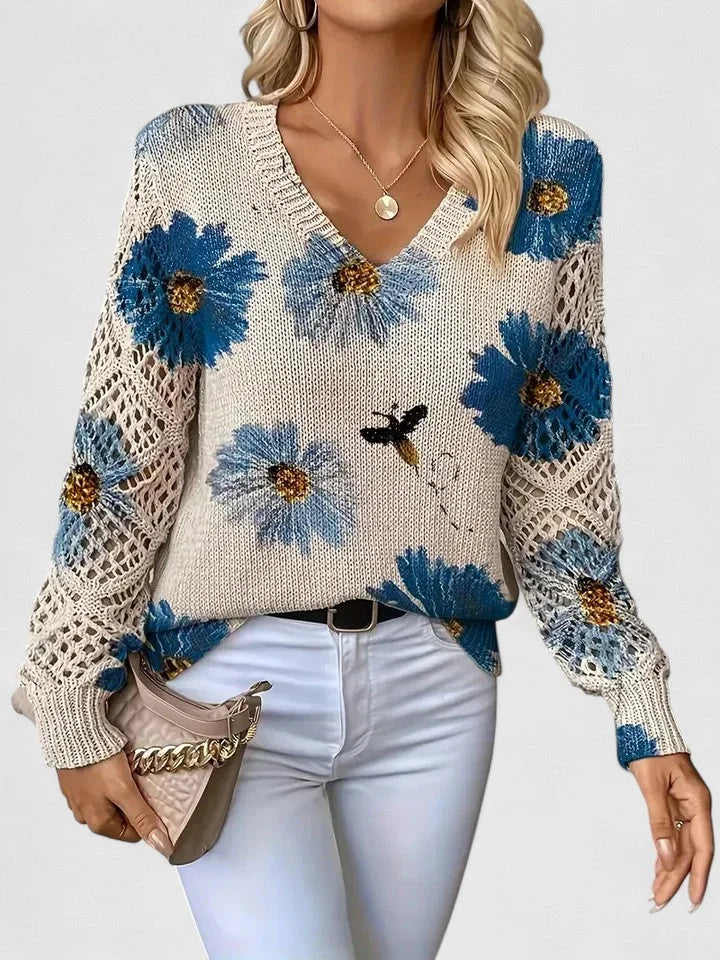 Blauer Damenpullover mit Floralmuster und V-Ausschnitt, aus weichem Baumwollgemisch, ideal für täglichen Komfort.