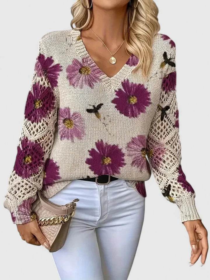 Damenpullover in Lila mit Floralmuster, V-Ausschnitt und aus weichem, atmungsaktivem Material für Komfort und Stil.