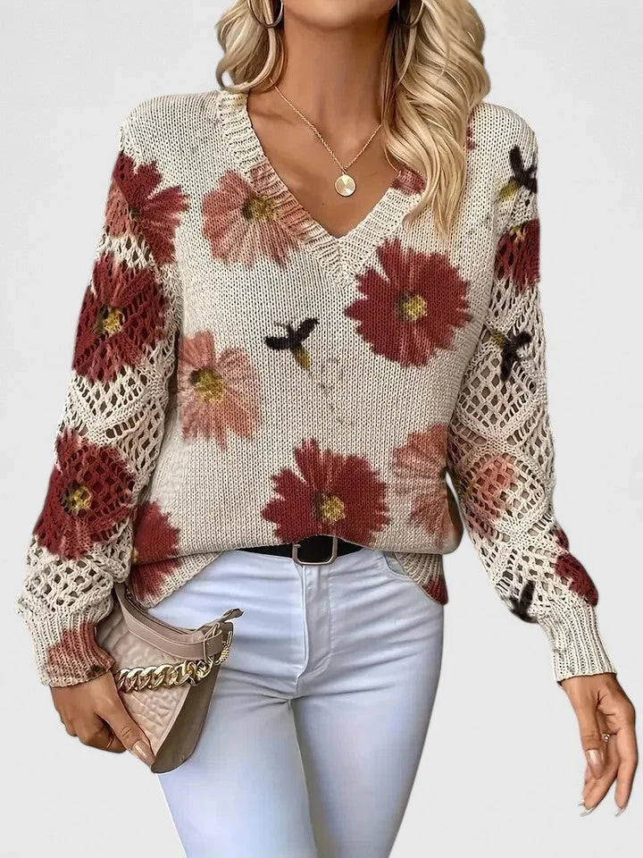 Roter Damenpullover mit V-Ausschnitt und floralen Muster aus weicher Baumwolle, ideal für lässige Anlässe.