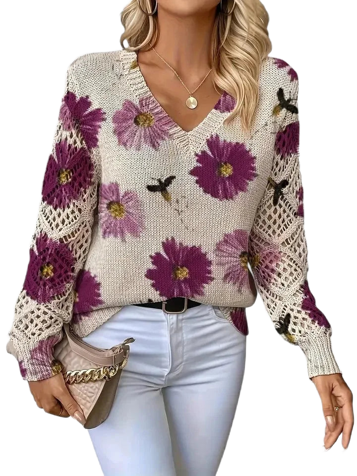 Damenpullover in Lila mit Floralmuster, V-Ausschnitt und aus weichem, atmungsaktivem Material für Komfort und Stil.