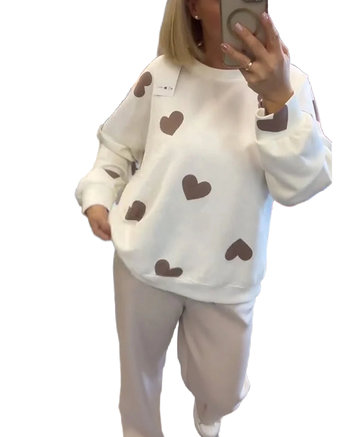 Damen Pullover in Weiß aus Baumwollmix mit Herzmuster für einen lässigen, gemütlichen Look.