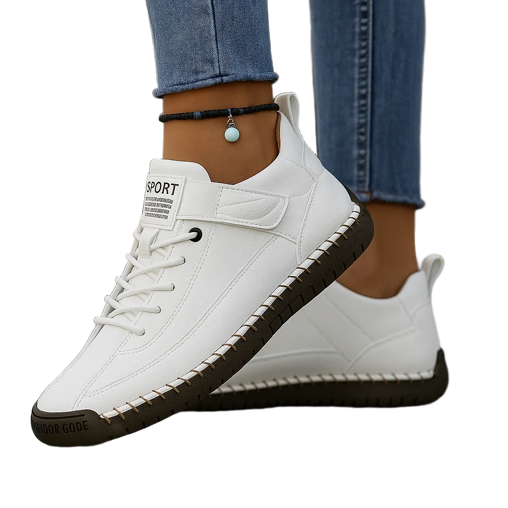 Damen Sneaker in Weiß mit elastischer Sohle, Klettverschluss und atmungsaktivem Obermaterial für komfortablen Tragekomfort.