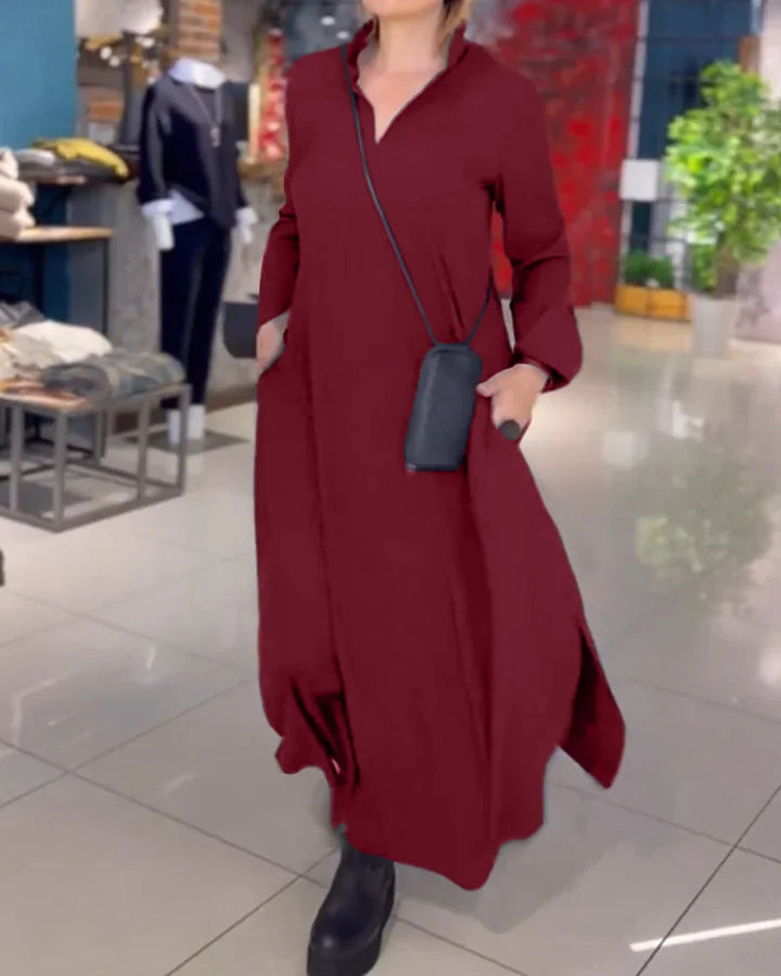Elegantes rotes Damen Maxikleid aus leichtem Stoff mit Seitenschlitz und femininen Kragen für einen lässigen Look.