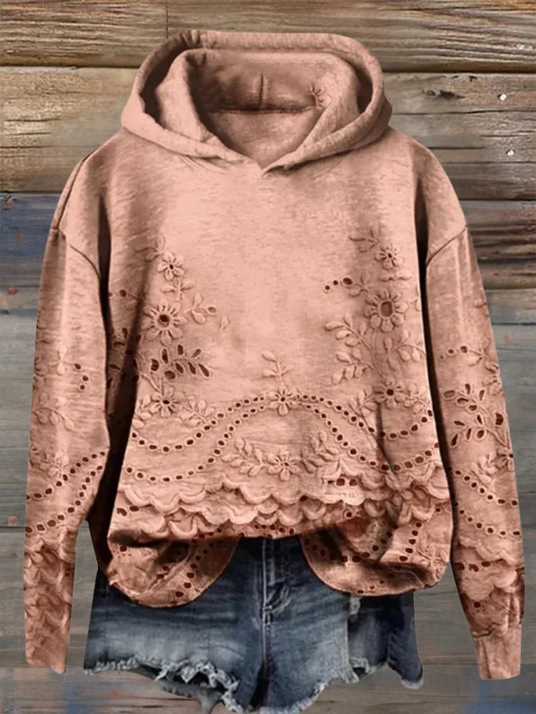 Orange Kapuzenpullover aus Baumwolle mit floraler Stickerei und lässigem Schnitt, ideal für entspannte Freizeitoutfits.