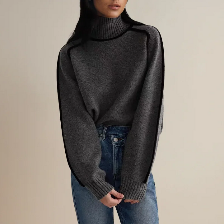 "Beiger Pullover mit Rollkragen aus weicher Baumwolle, ideal für einen lässigen Herbst-Look mit legerem Schnitt."