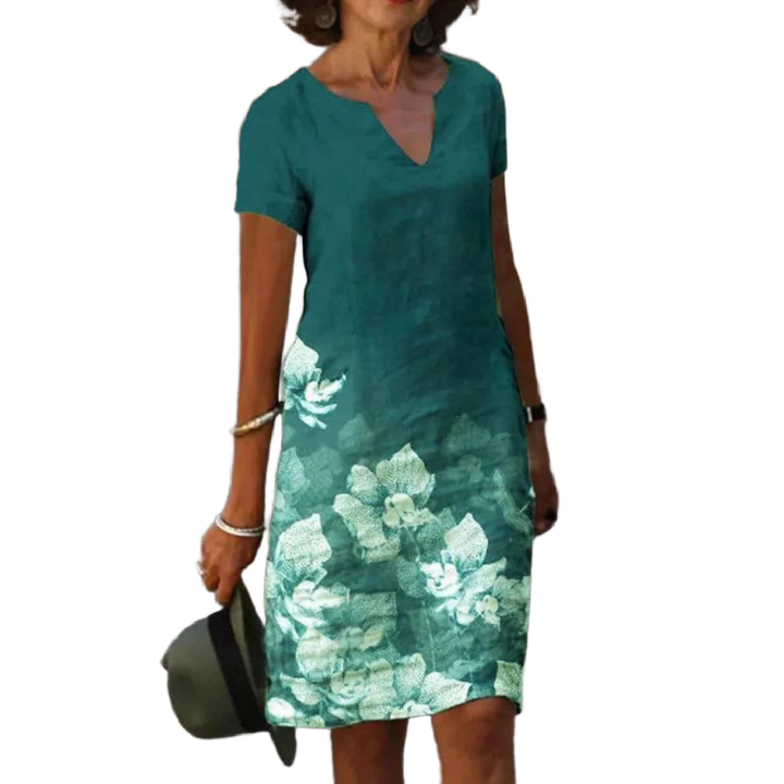 Grünes Damen Sommerkleid mit Blumendruck, V-Ausschnitt und luftigem Stoff - perfekt für sonnige Tage und entspannte Outfits.
