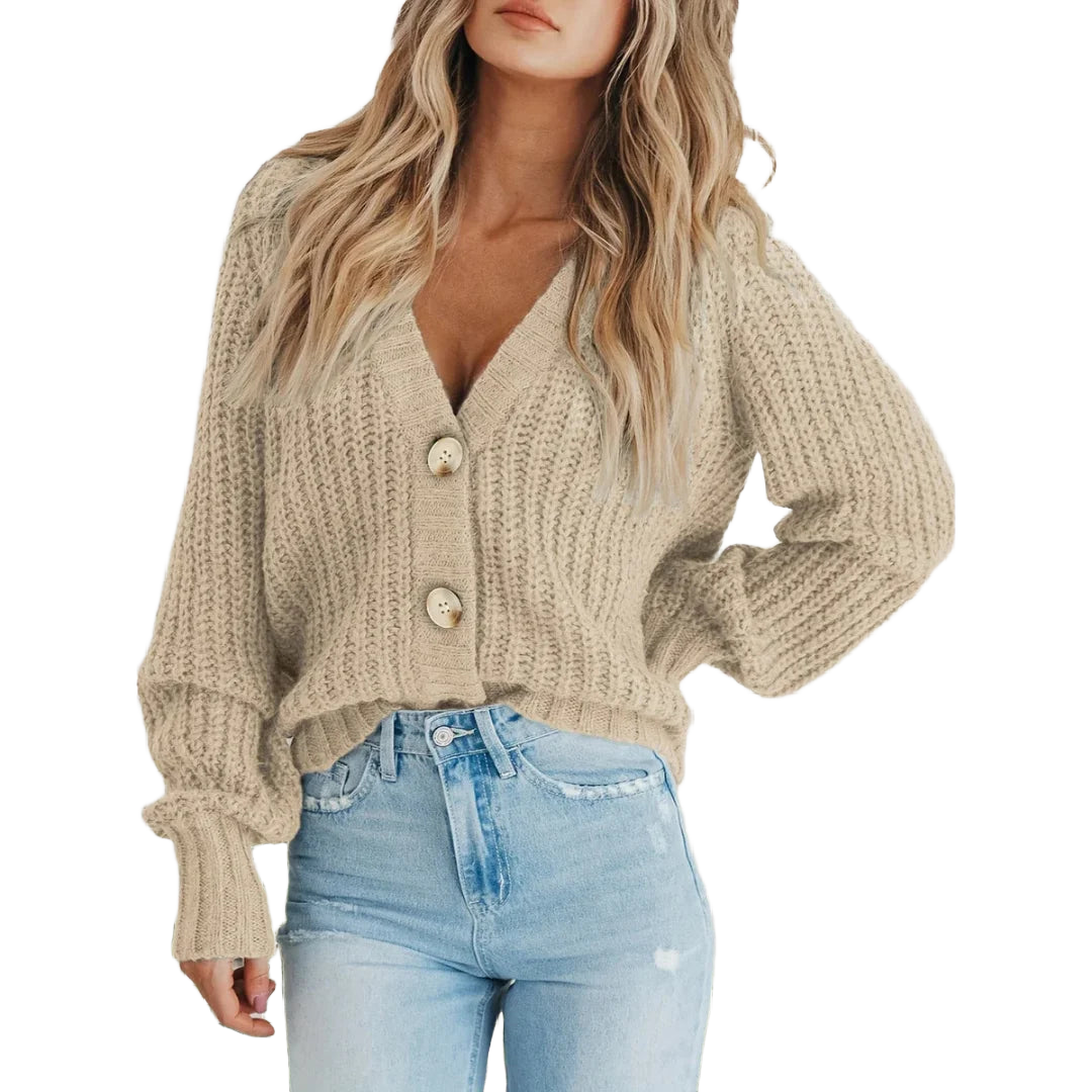 Beige Damen Strickjacke aus weichem Material mit Knopfleiste und langen Ärmeln, ideal für komfortable Alltagsmode.