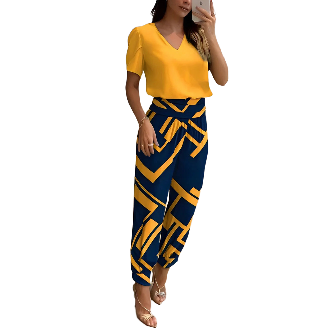 Elegante Damenbluse mit gemusterter Hose in gelb-blauer Print, aus leichter Baumwolle, mit lockerer Passform und modernen…